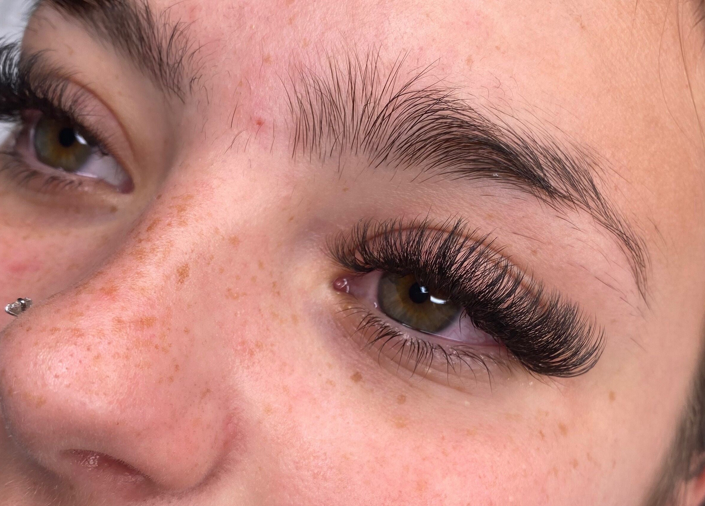 Close-up of expertly applied eyelash extensions at Neeve Backhouse in Marske-by-the-sea, England, GB.