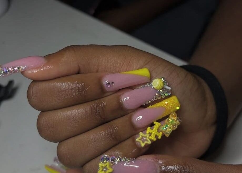 Colorful nail design with embellishments at Nails Byyp Imiya, Forney, Texas, US.