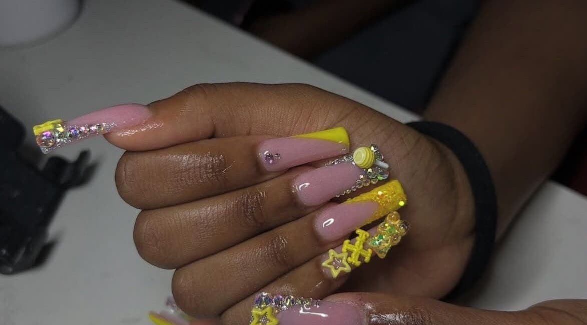 Colorful nail design with embellishments at Nails Byyp Imiya, Forney, Texas, US.