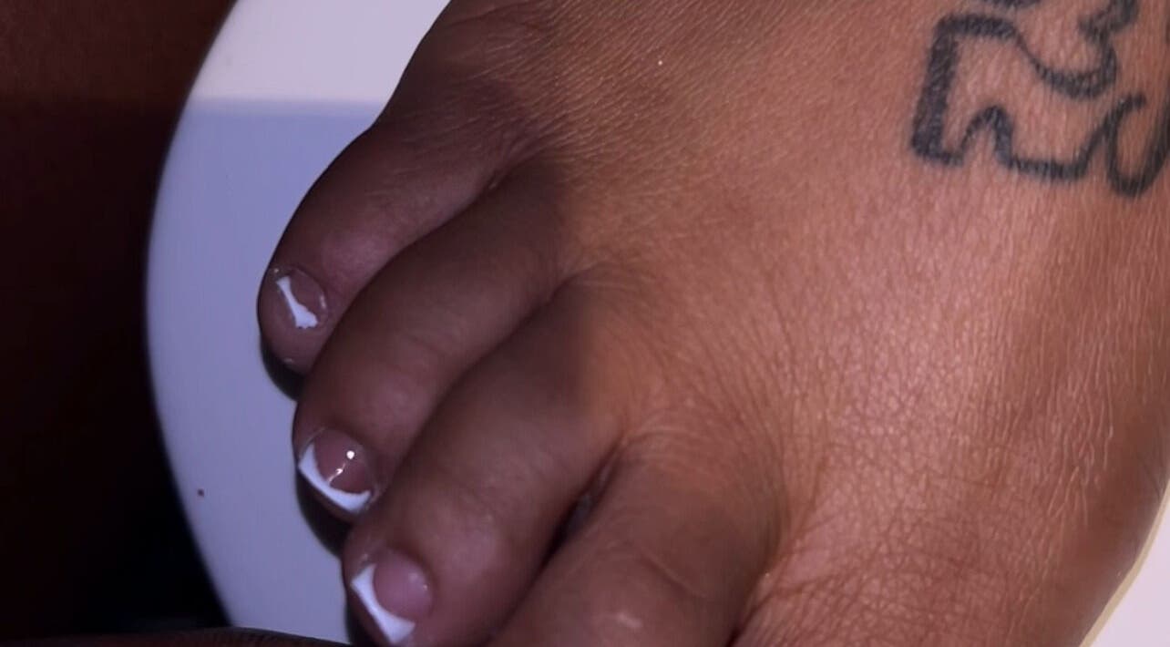 French pedicure at Nails Byyp Imiya, Forney, Texas, US, showcasing elegant white-tipped toenails.