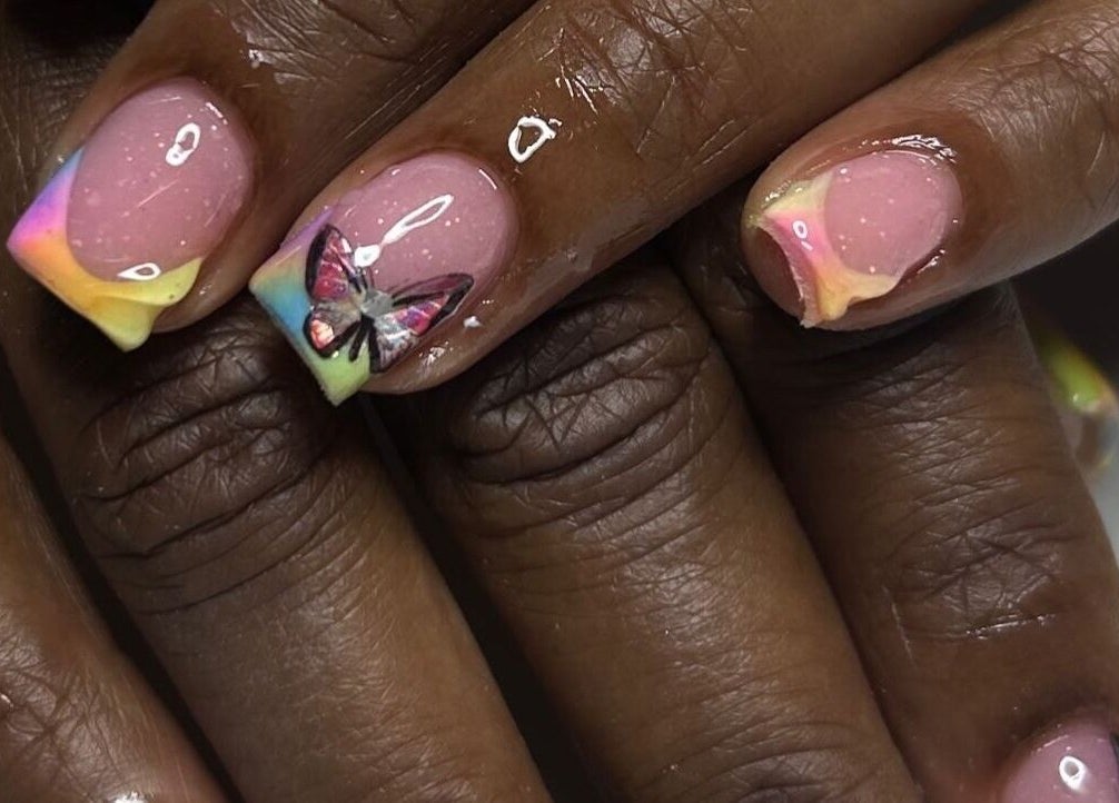 Colorful butterfly nail art by Nails Byyp Imiya in Forney, Texas, US.