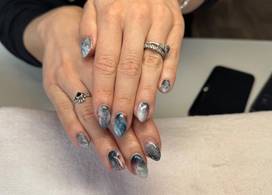 Stylish marble nails at Beauty by Joanne, Dundee, Scotland, GB. Perfect blend of grey, black, and white hues.