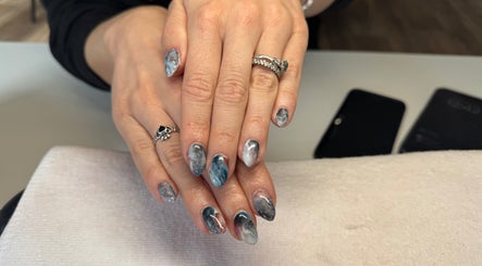 Stylish marble nails at Beauty by Joanne, Dundee, Scotland, GB. Perfect blend of grey, black, and white hues.