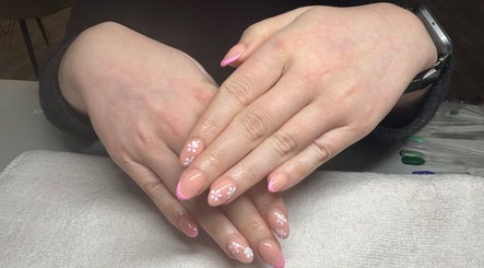 Floral nail art with pink tips at Beauty by Joanne, Dundee, Scotland, GB.