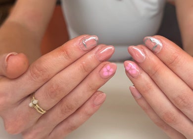 Beautiful pink nail art with floral design at Beauty by Joanne, Dundee, Scotland, GB.