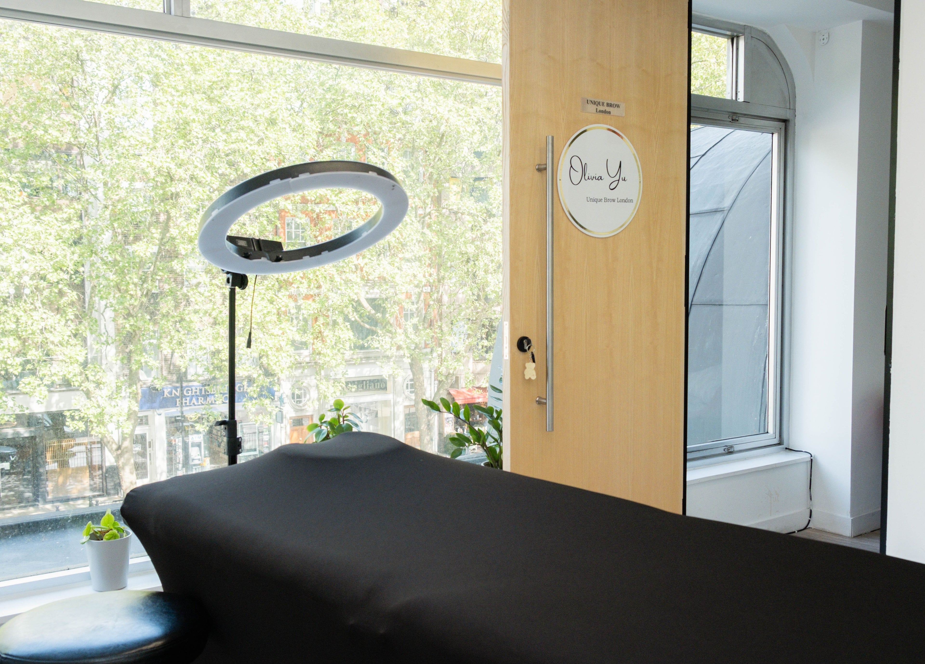 Relaxing treatment room at Unique Brow London with natural light in London, England, GB.