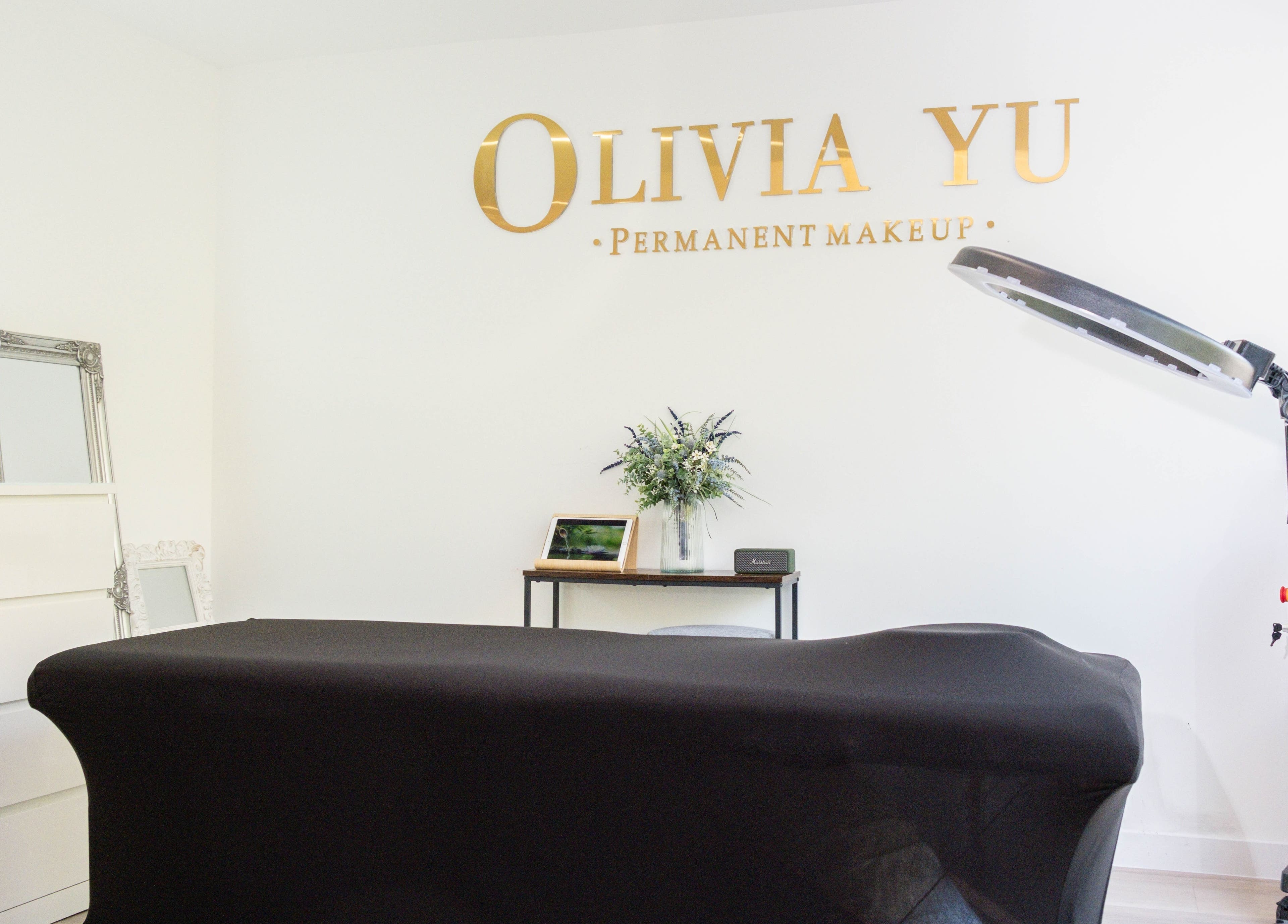 Chic beauty treatment room at Unique Brow London, London, England, GB, featuring stylish decor and modern equipment.