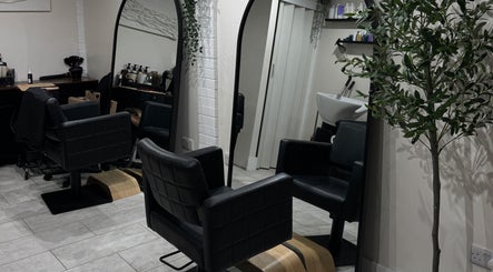 Chic styling chairs and mirrors at Coloured by Madison, Plymouth, England, GB, showcasing modern salon design.
