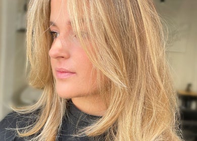 Close-up of woman with blonde hair styled at Coloured by Madison, Plymouth, England, GB.