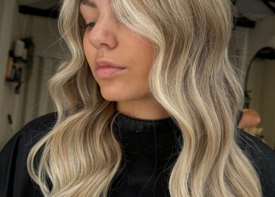 Blonde hair with soft waves styled at Coloured by Madison, Plymouth, England, GB.
