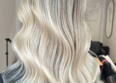 Blonde wavy hair styled at Coloured by Madison in Plymouth, England, GB salon.