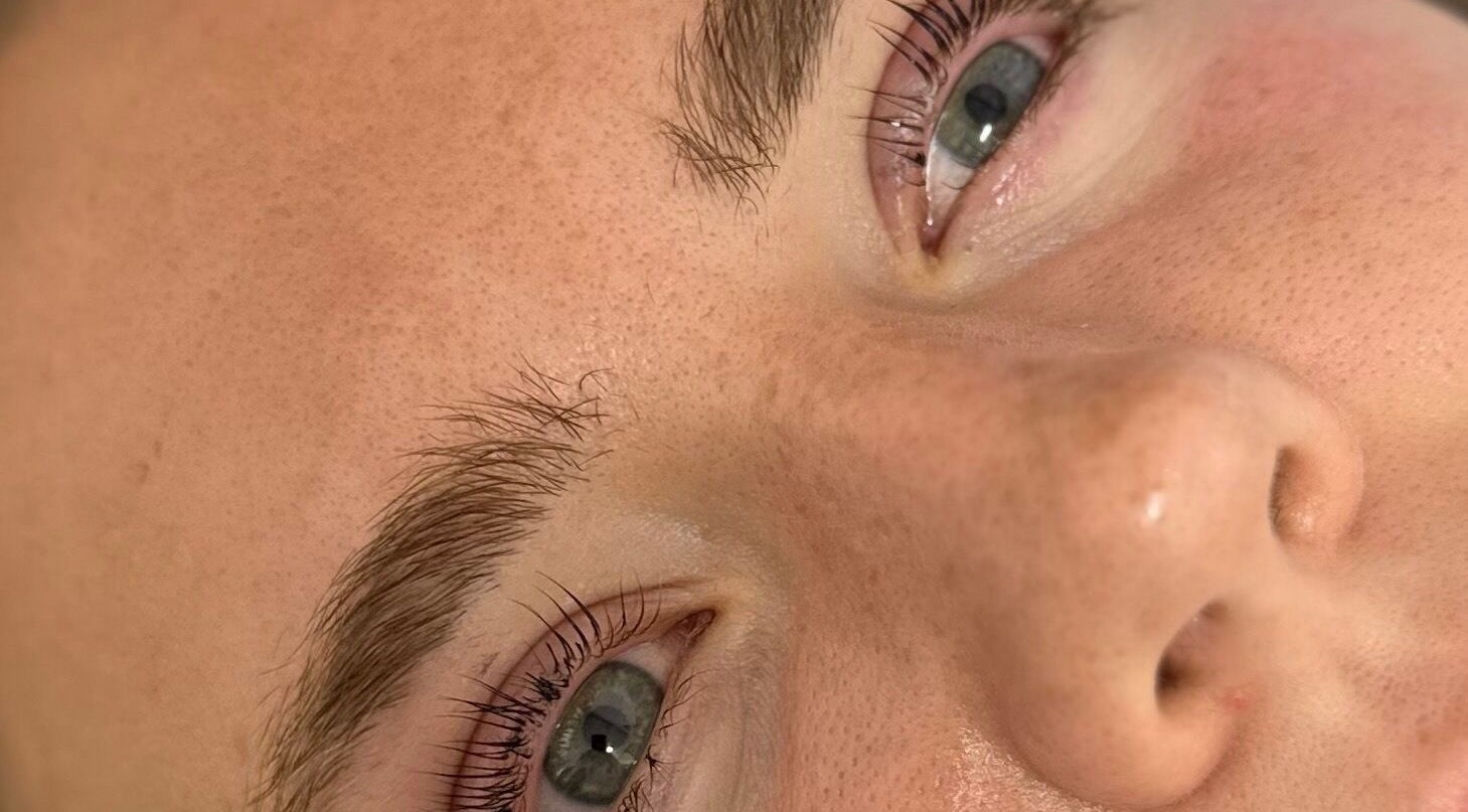 Close-up of styled lashes at Beauty by Becca, Masham, England, GB. Perfectly groomed eyebrows visible.