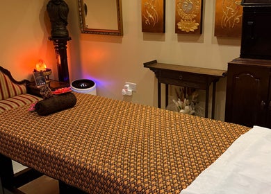 Relaxing massage room at Wandee Thai Massage LTD, Staines-upon-Thames, England, GB with warm lighting.
