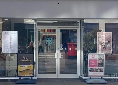 Entrance of Wandee Thai Massage LTD in Staines-upon-Thames, England showcasing welcoming signage.