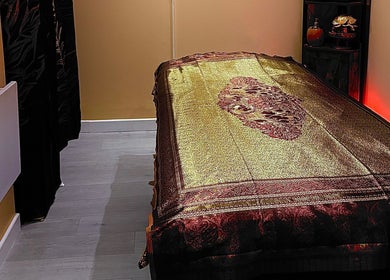 Cozy massage room at Wandee Thai Massage LTD in Staines-upon-thames, England, GB, featuring elegant decor.