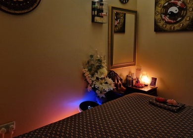 Peaceful treatment room at Wandee Thai Massage LTD, Staines-upon-Thames, England, GB with ambient lighting.