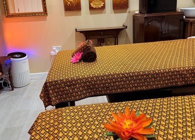 Calming massage room at Wandee Thai Massage LTD in Staines-upon-thames, England, GB, showcasing elegant decor.