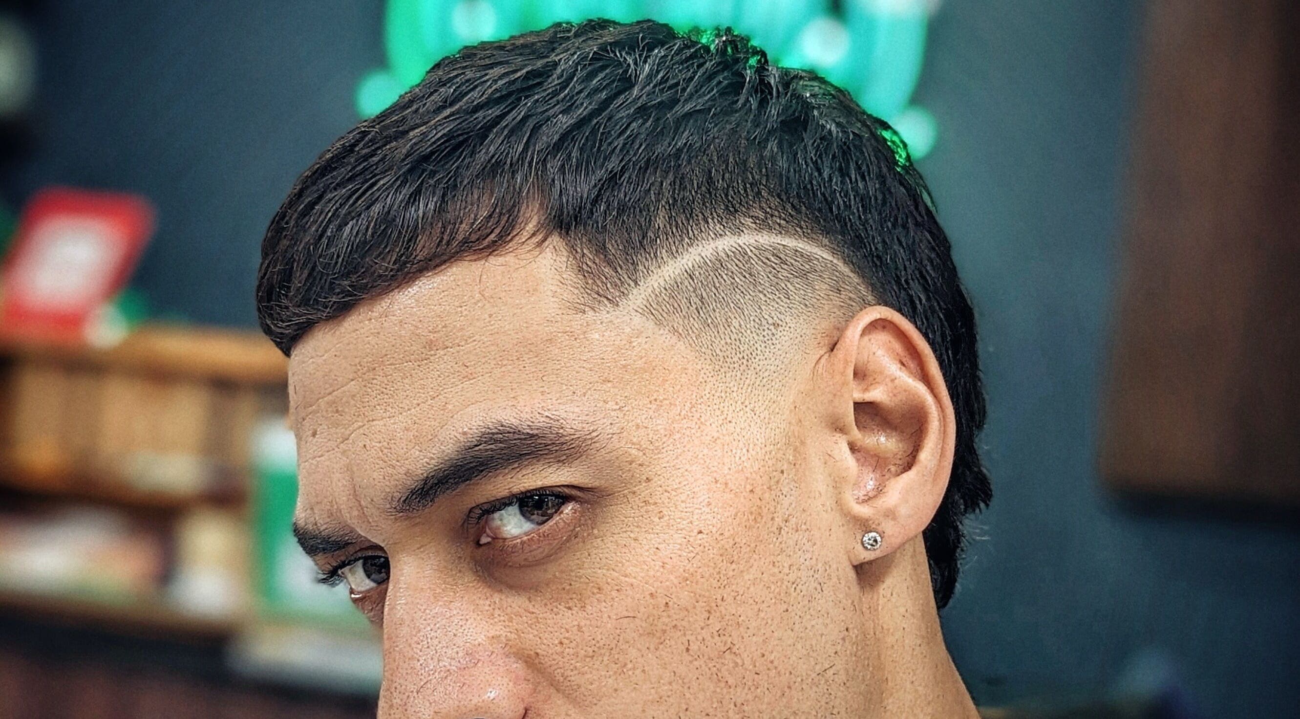 Close-up of a stylish haircut at Barber Zeph, Hong Kong Island, HK, featuring a precise design.