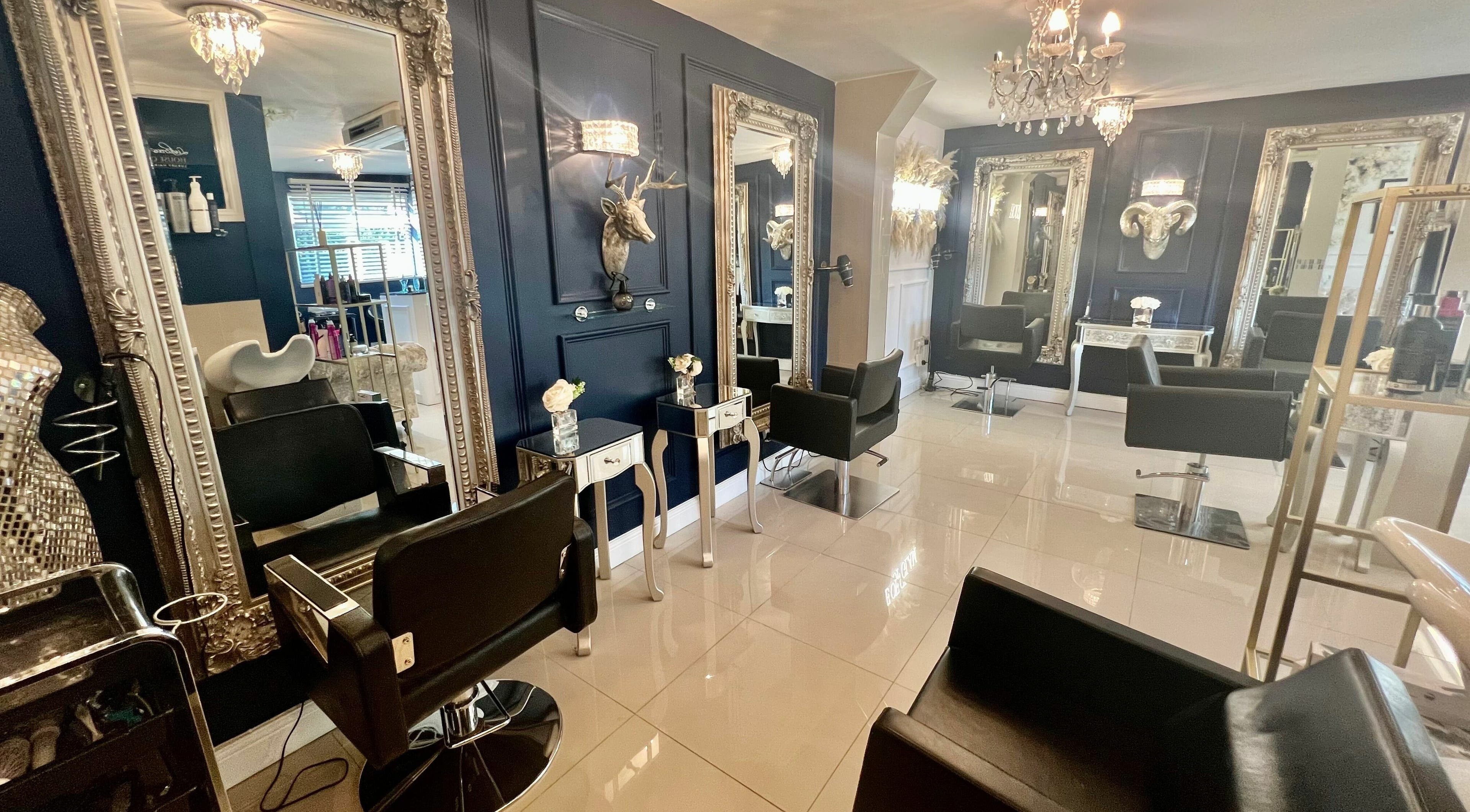 Sophisticated interior of Ludicrous Lengths salon, Thornbury, England, GB with chic mirrors and modern decor.