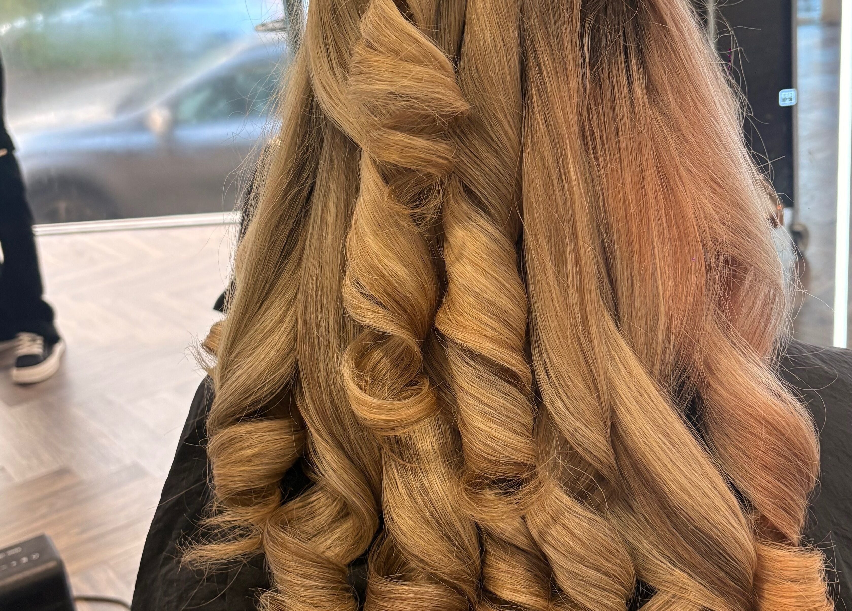 Elegant curled hairstyle at Hair by Olivia Bain, Kirkintilloch, Scotland, GB.