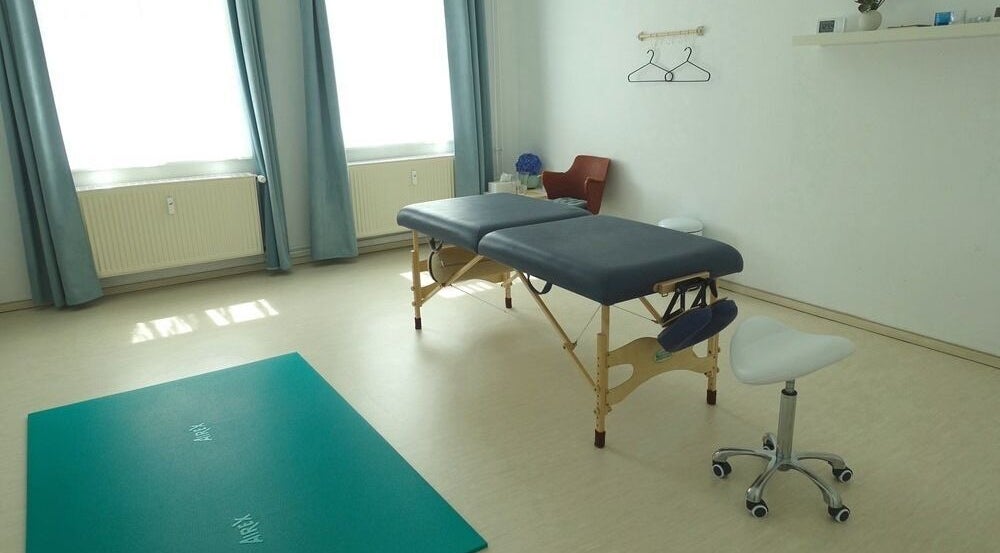 Serene therapy room at Hirai Healing East at HAVEN, Berlin, Berlin, DE featuring massage table and calming decor.