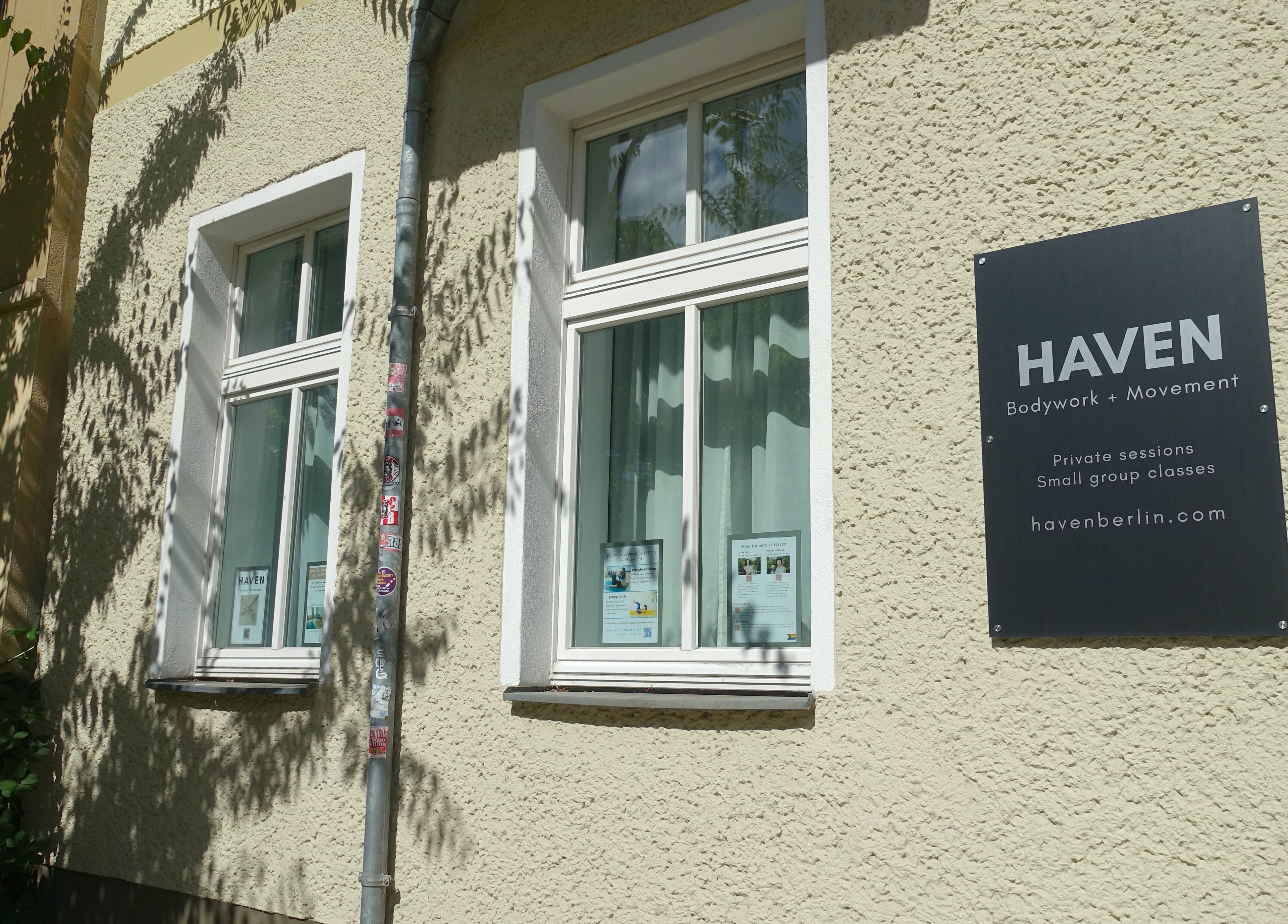 Exterior of Hirai Healing East at HAVEN in Berlin, Berlin, DE with signage on a sunny day.