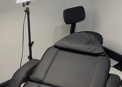 Treatment chair at G’lamore Ink & Beauty, Birmingham, England, GB, ideal for relaxing beauty sessions.