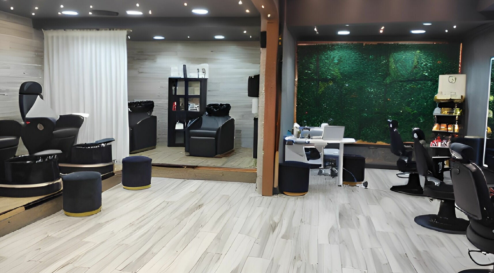 Chic interior of Fit Social salon in Dubai, Dubai, AE with modern chairs and lush greenery wall.