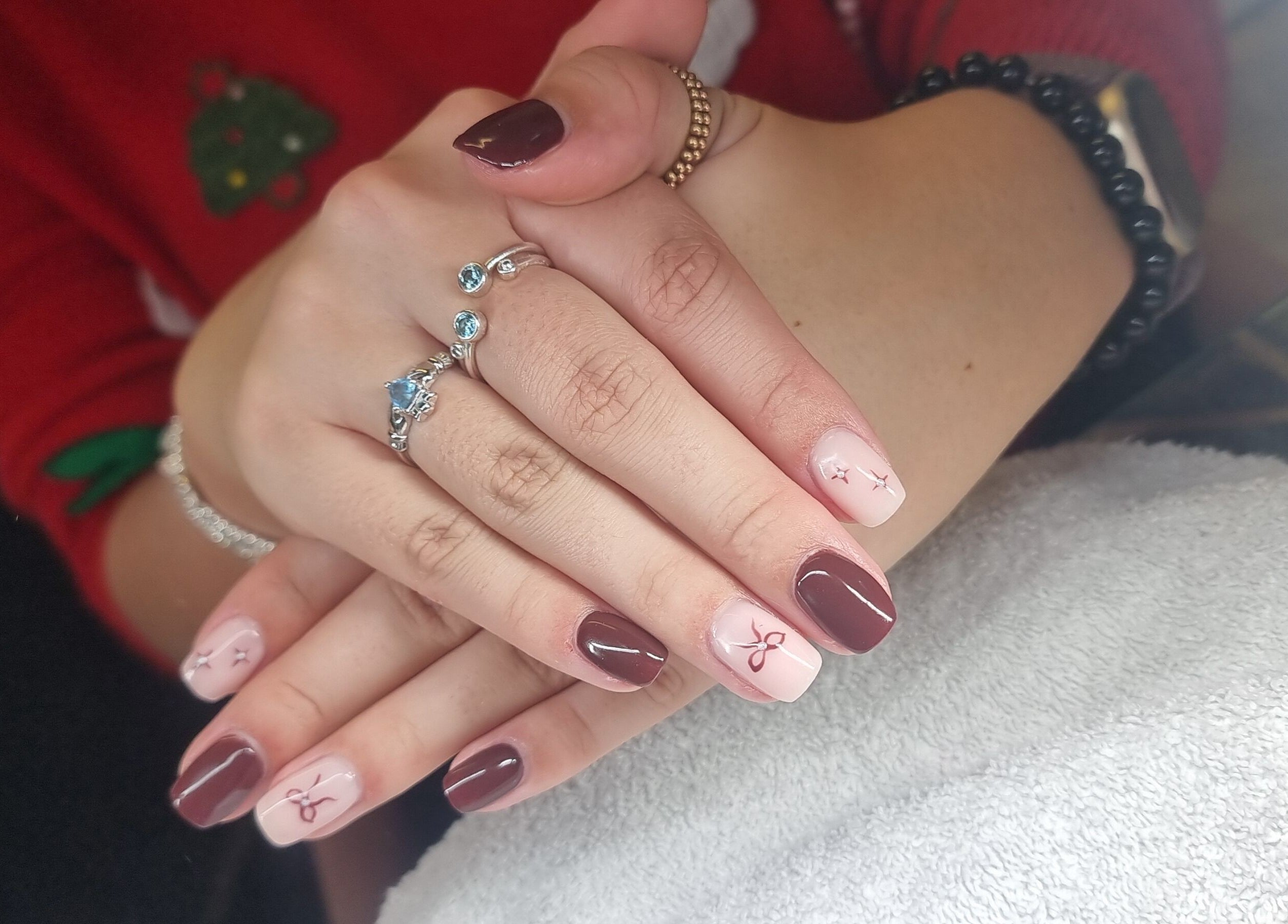 Elegant nail art at Be.You.Tiful in Fivemiletown, Northern Ireland, GB showcasing intricate designs.