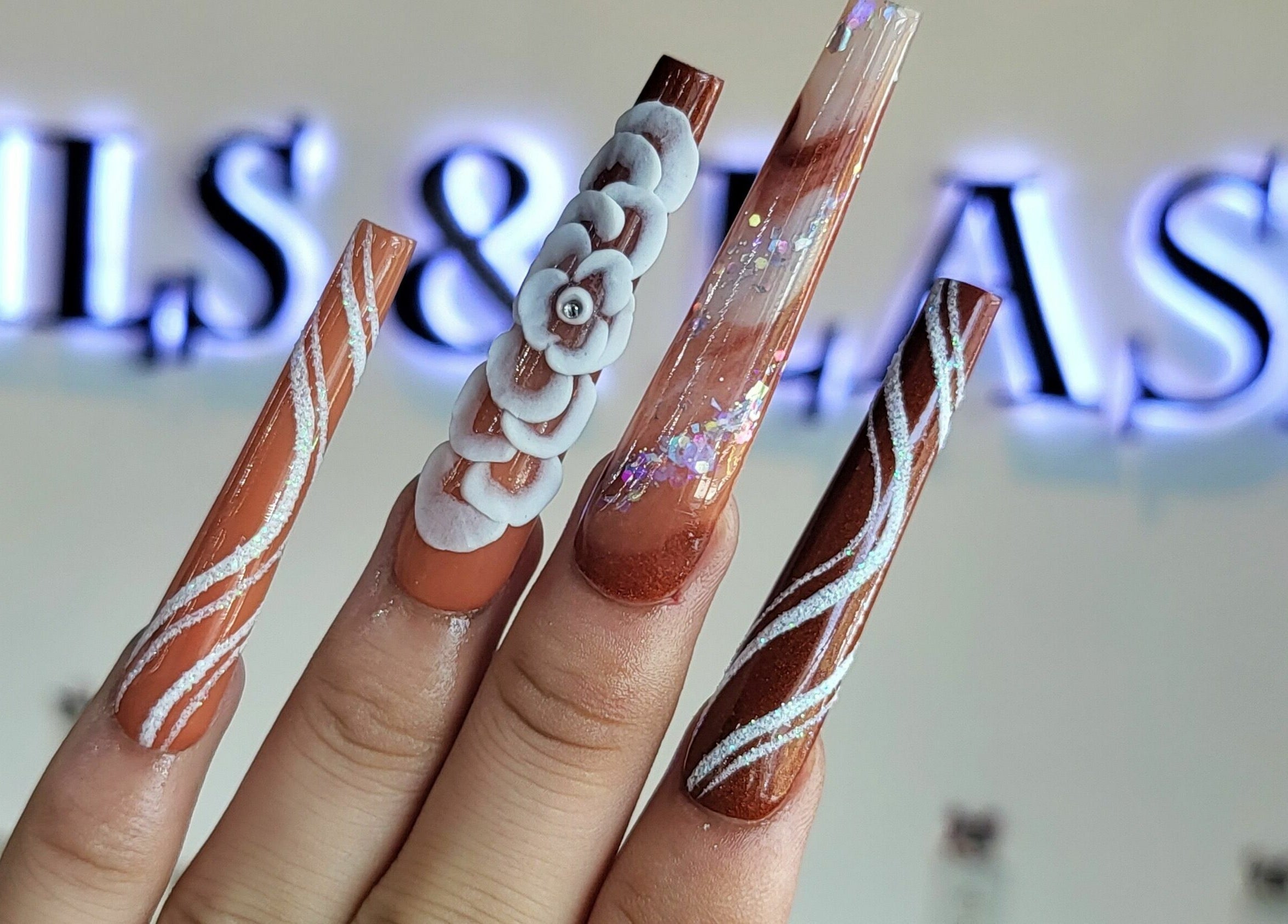 Exquisite nail art design at Trendy Nails Spa, Scottsdale, Arizona, US featuring intricate patterns.