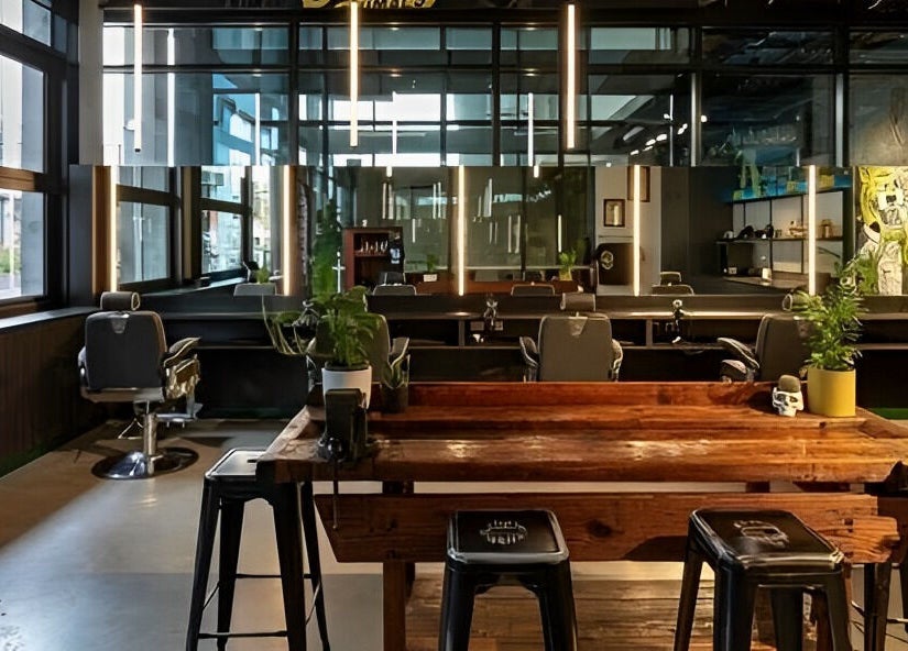 Chic interior of Social Animals Barbershops in Melbourne, Victoria, AU with modern chairs and decor.