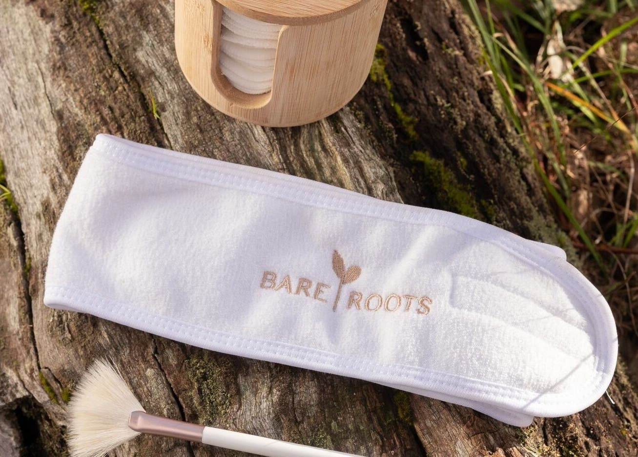 Jimboomba Esthetics | Whitby Cct Location showcases spa headband and brush set on wood in Jimboomba, Queensland, AU.