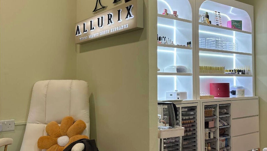 Allurix Nail Salon interior showcasing chic nail polish display and cozy seating, Singapore, Singapore, SG.