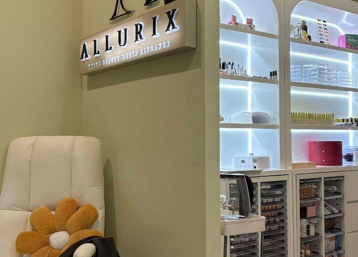 Allurix Nail Salon interior showcasing chic nail polish display and cozy seating, Singapore, Singapore, SG.