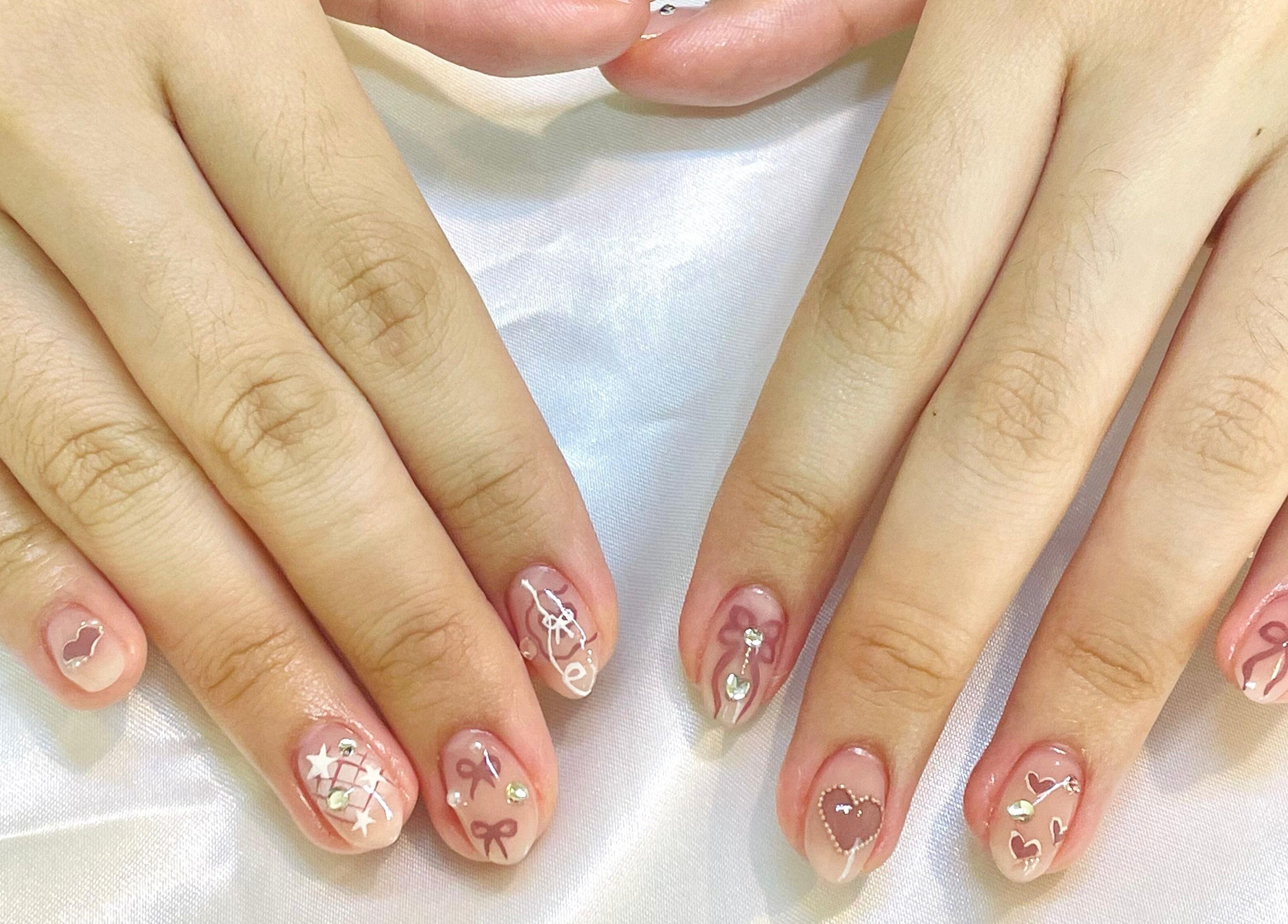 Elegant nail art design at Allurix Nail Salon, Singapore, SG, showcasing intricate detailing.
