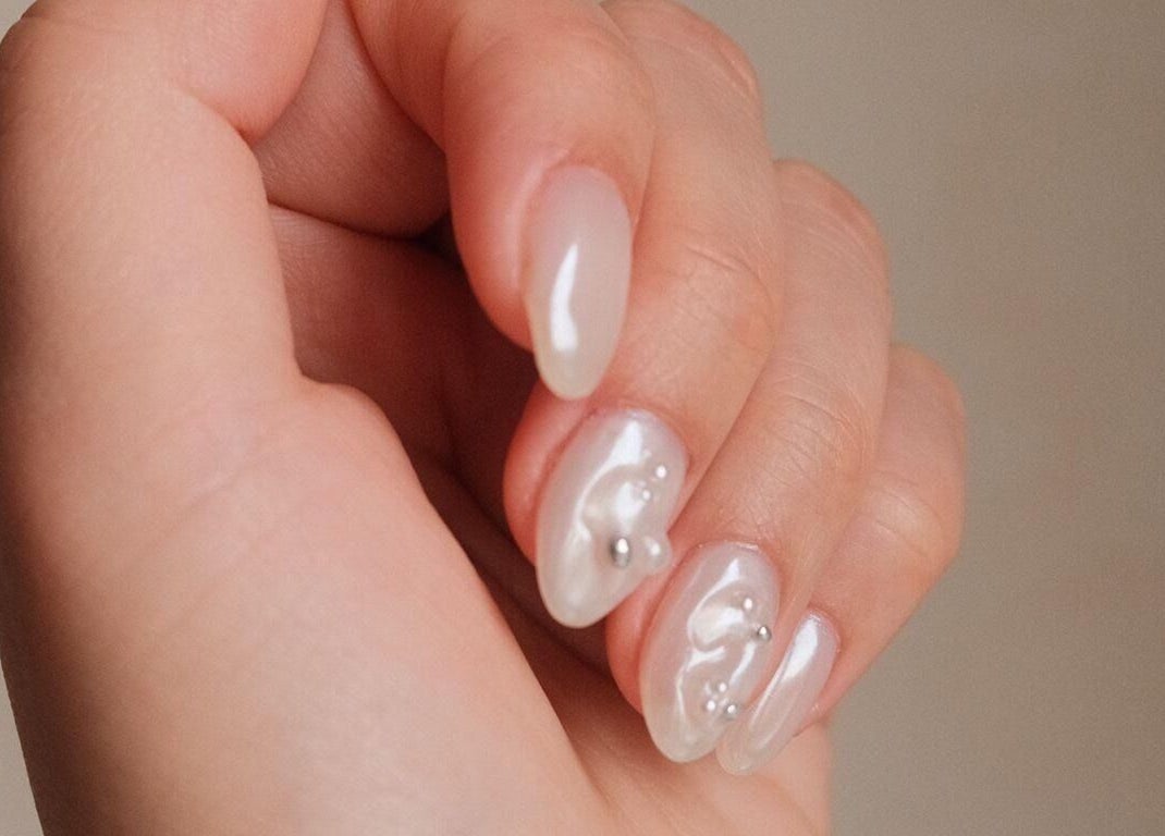 Elegant nail art with pearls at Allurix Nail Salon, Singapore, Singapore, SG.