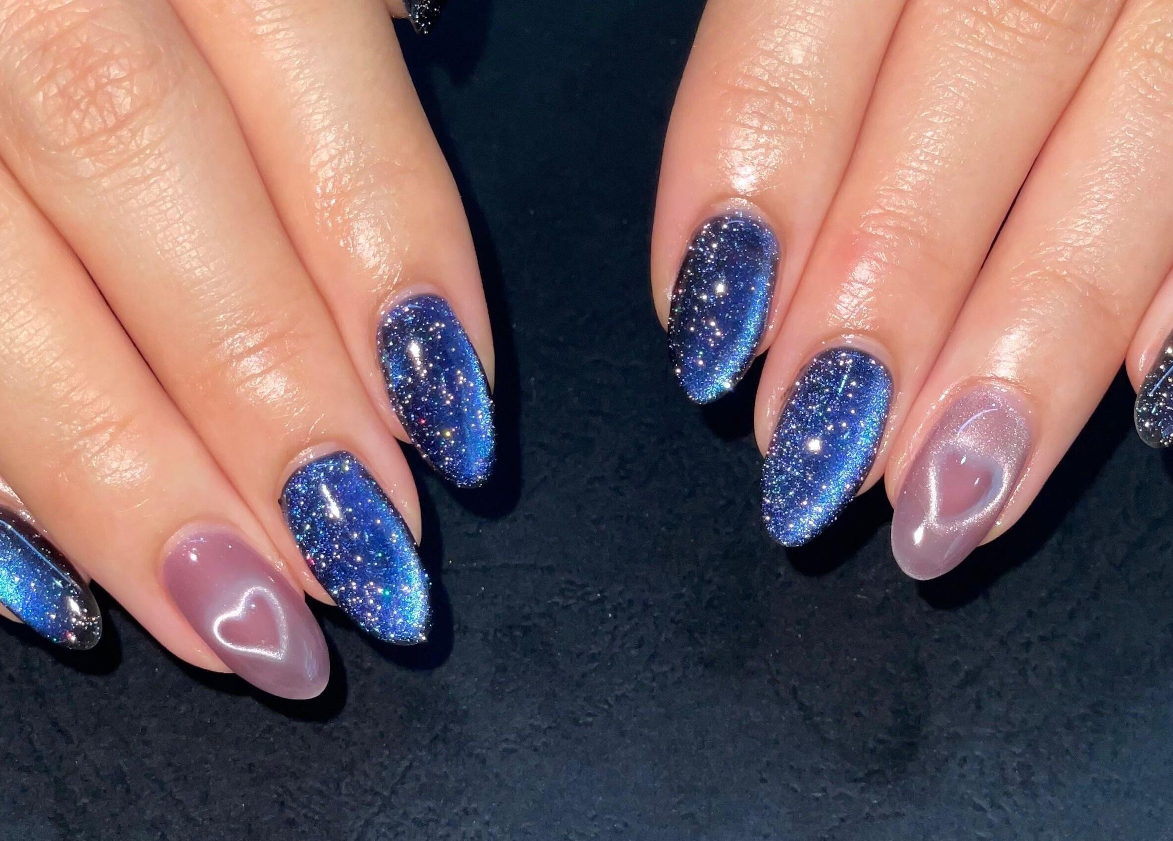 Sparkling cosmic nails at Allurix Nail Salon, Singapore, Singapore, SG showcasing galaxy-inspired design.