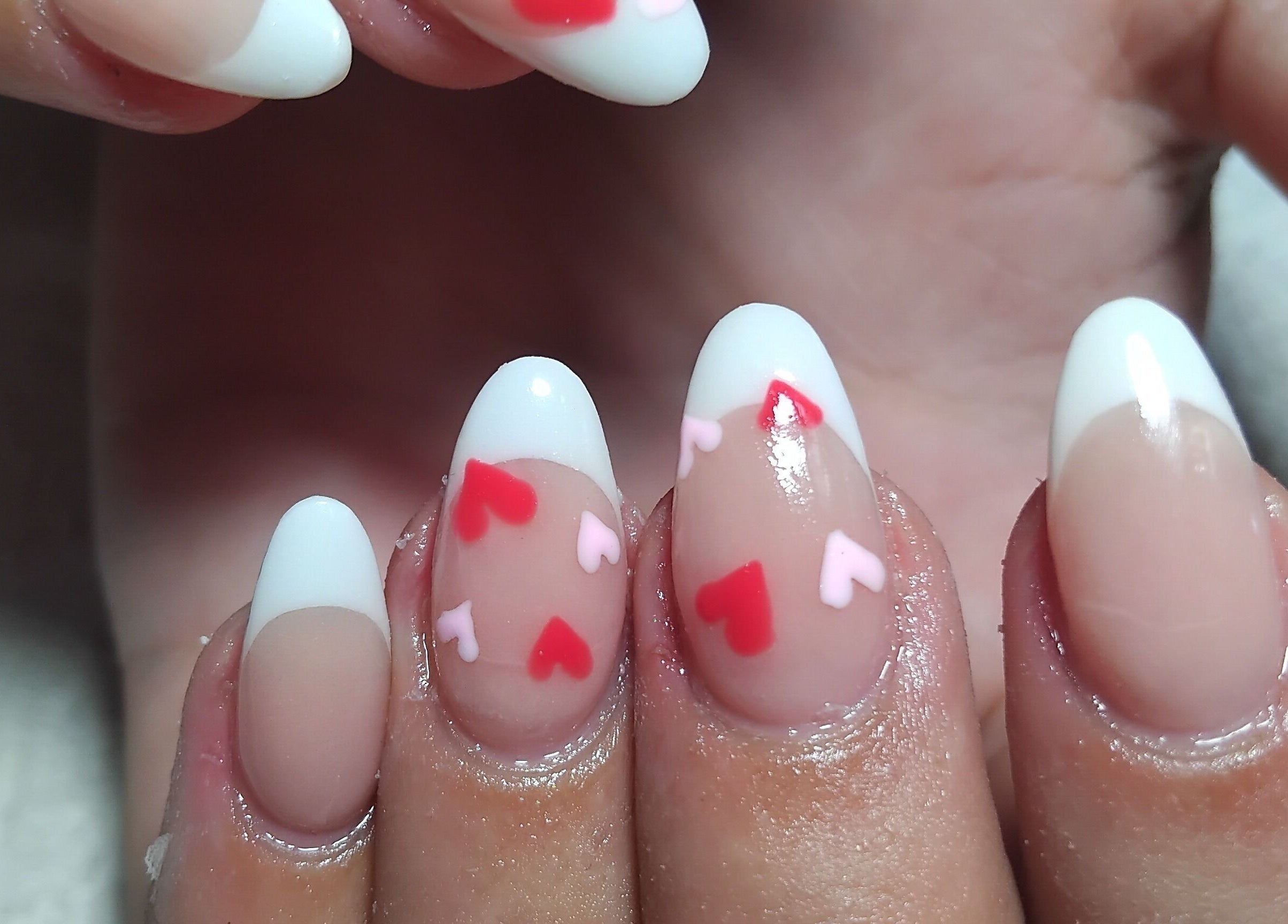 Heart-themed manicure at Lean-Tique in Bloemfontein, Free State, ZA showcasing elegant nail art.