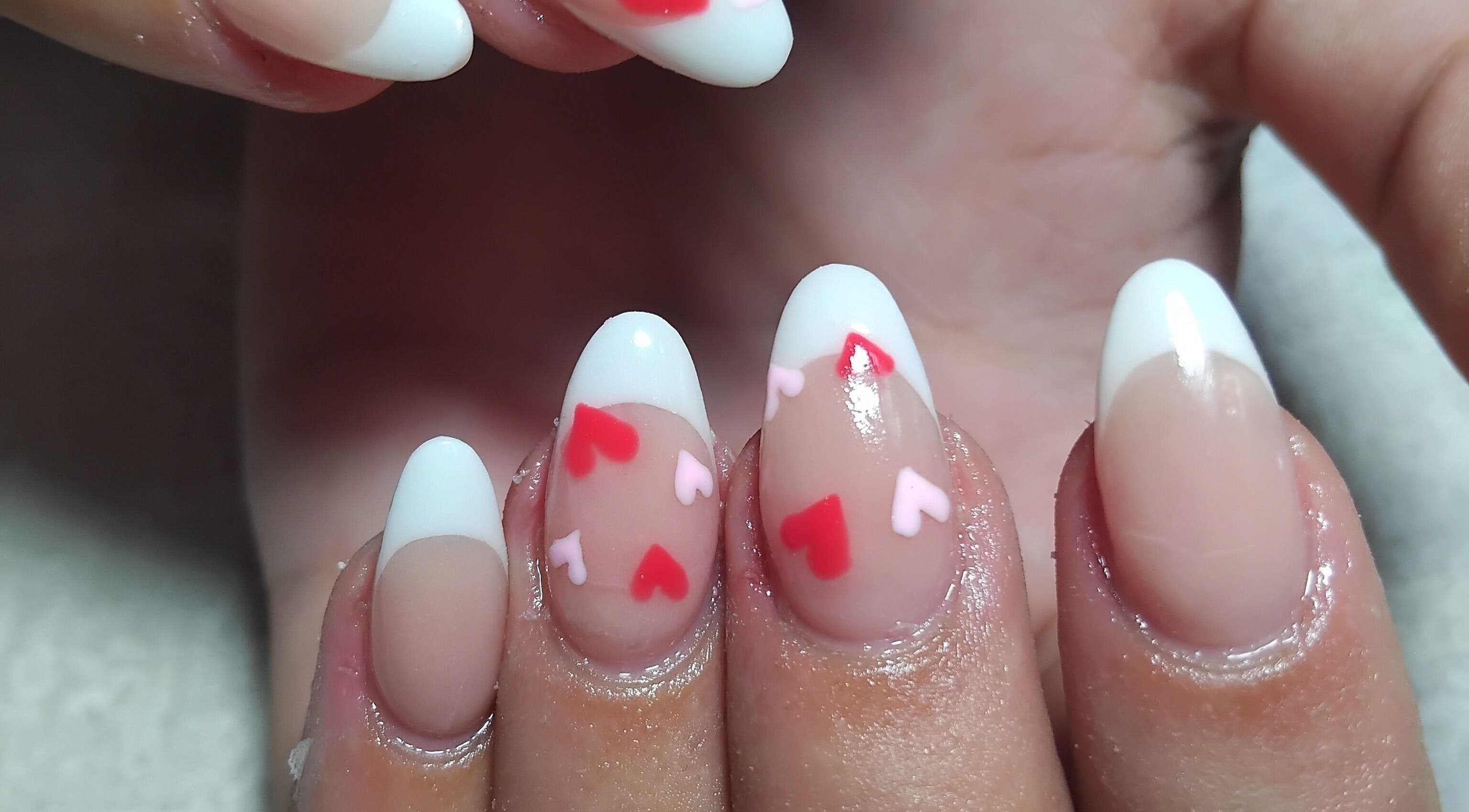 Heart-themed manicure at Lean-Tique in Bloemfontein, Free State, ZA showcasing elegant nail art.