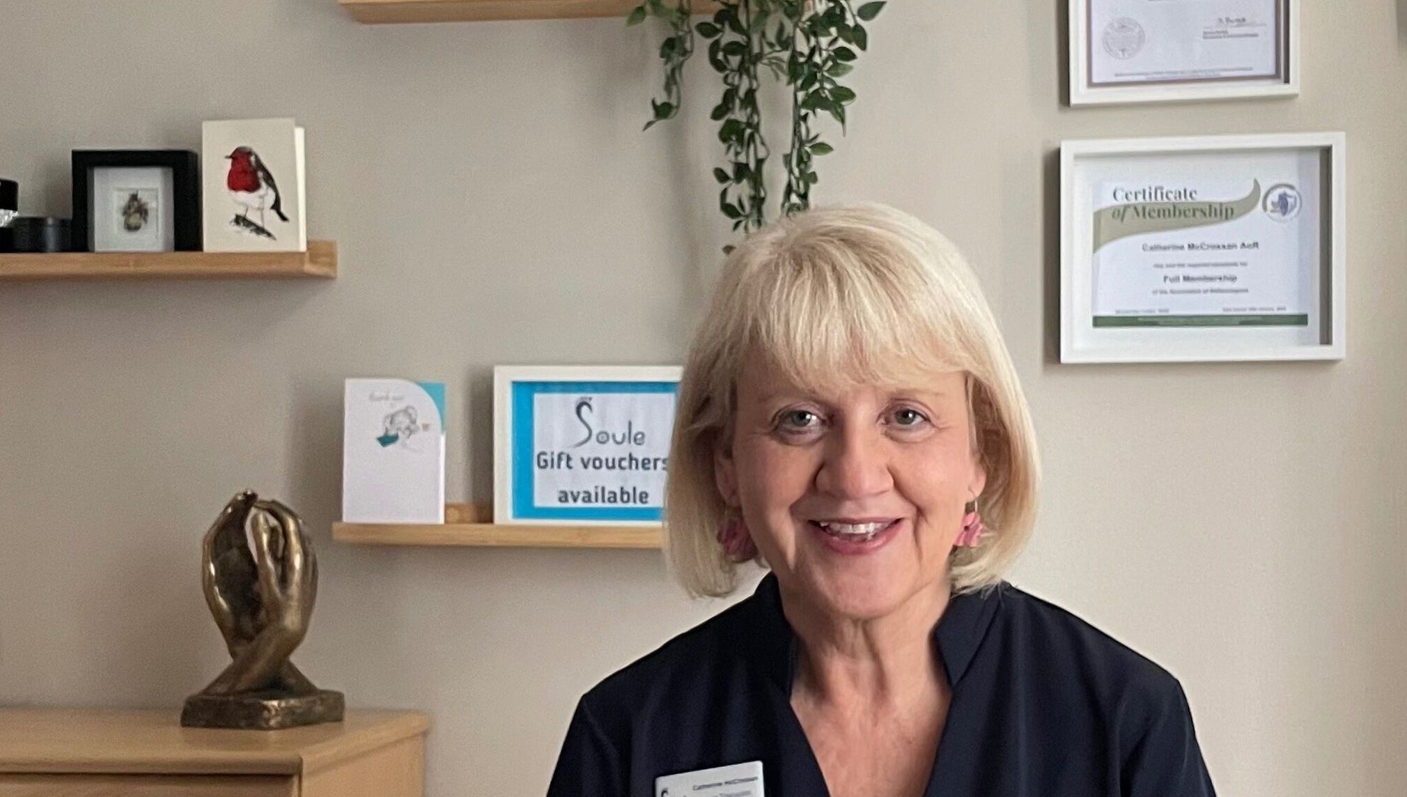 Warm welcome at Soule Therapies, Lisburn, Northern Ireland, GB, featuring a friendly therapist in a serene setting.