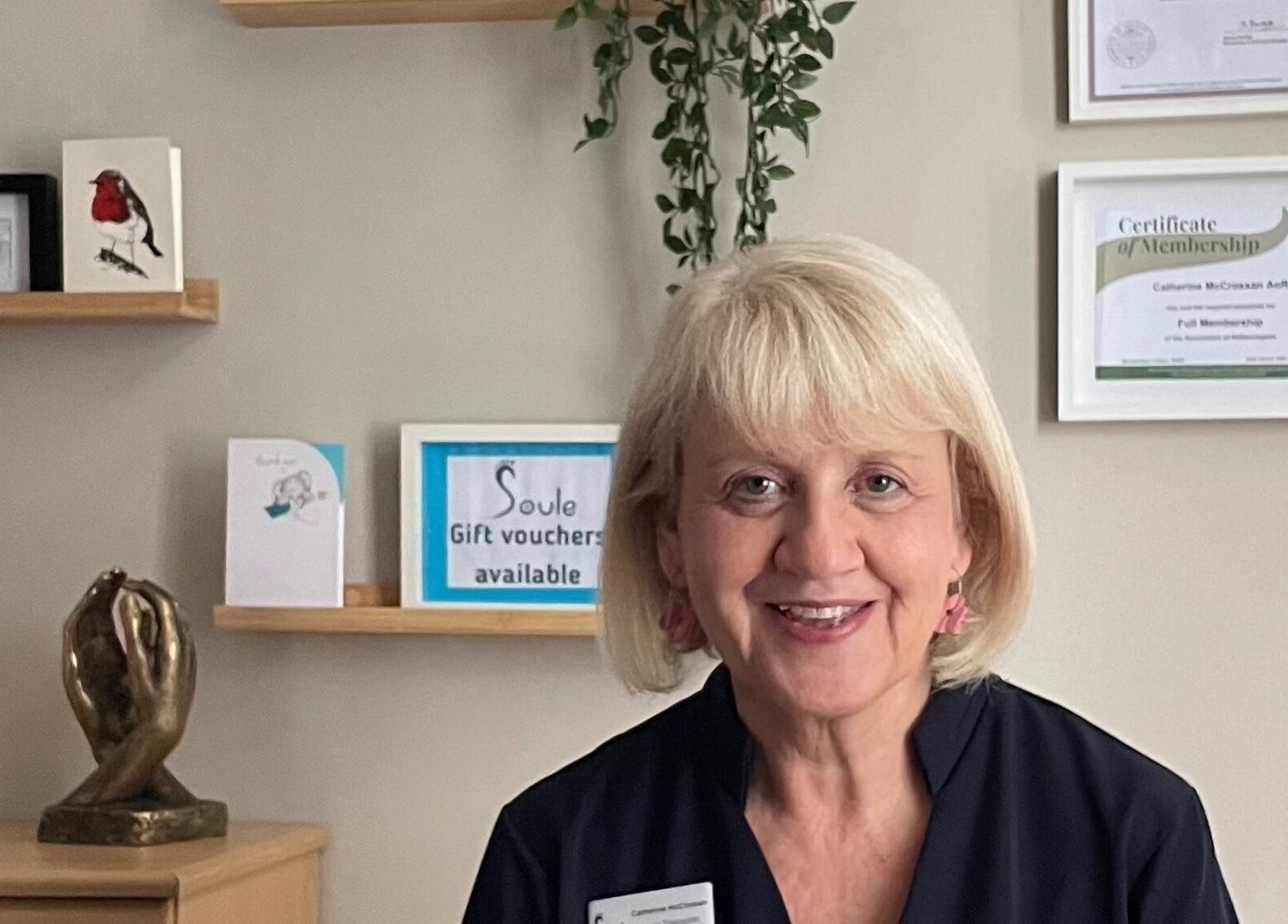 Warm welcome at Soule Therapies, Lisburn, Northern Ireland, GB, featuring a friendly therapist in a serene setting.