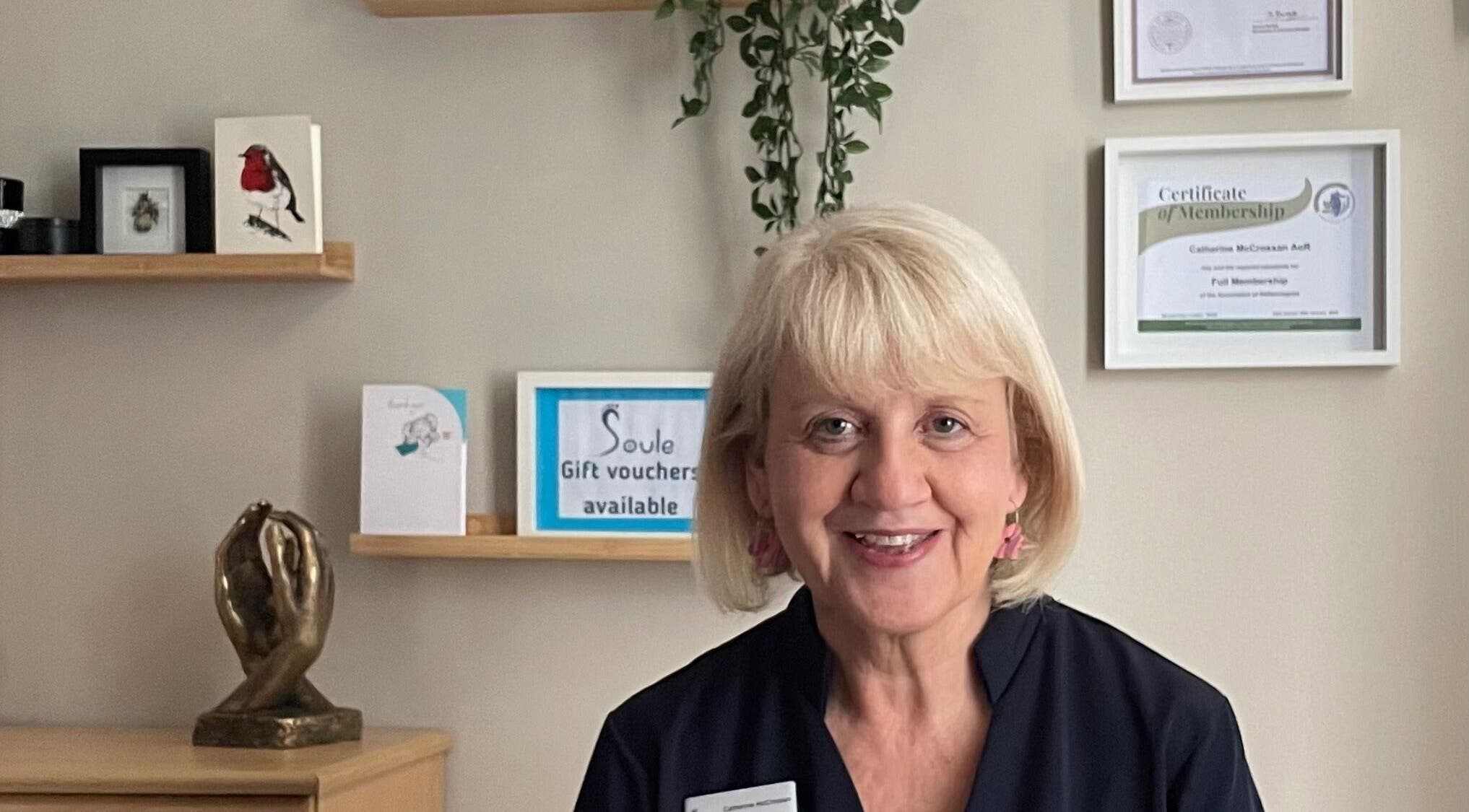 Warm welcome at Soule Therapies, Lisburn, Northern Ireland, GB, featuring a friendly therapist in a serene setting.