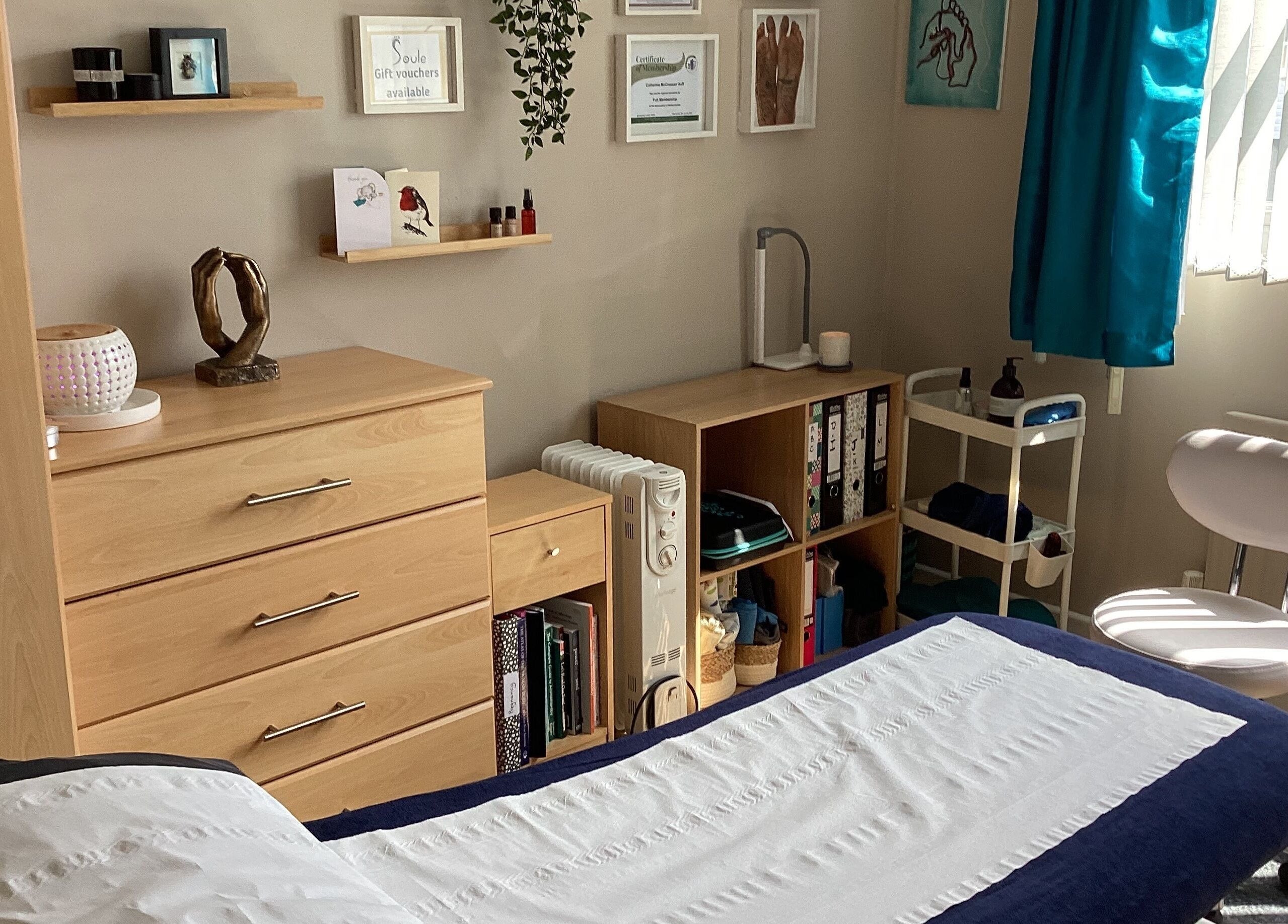 Relaxing therapy room at Soule Therapies, Lisburn, Northern Ireland, GB, featuring treatment bed and soothing decor.
