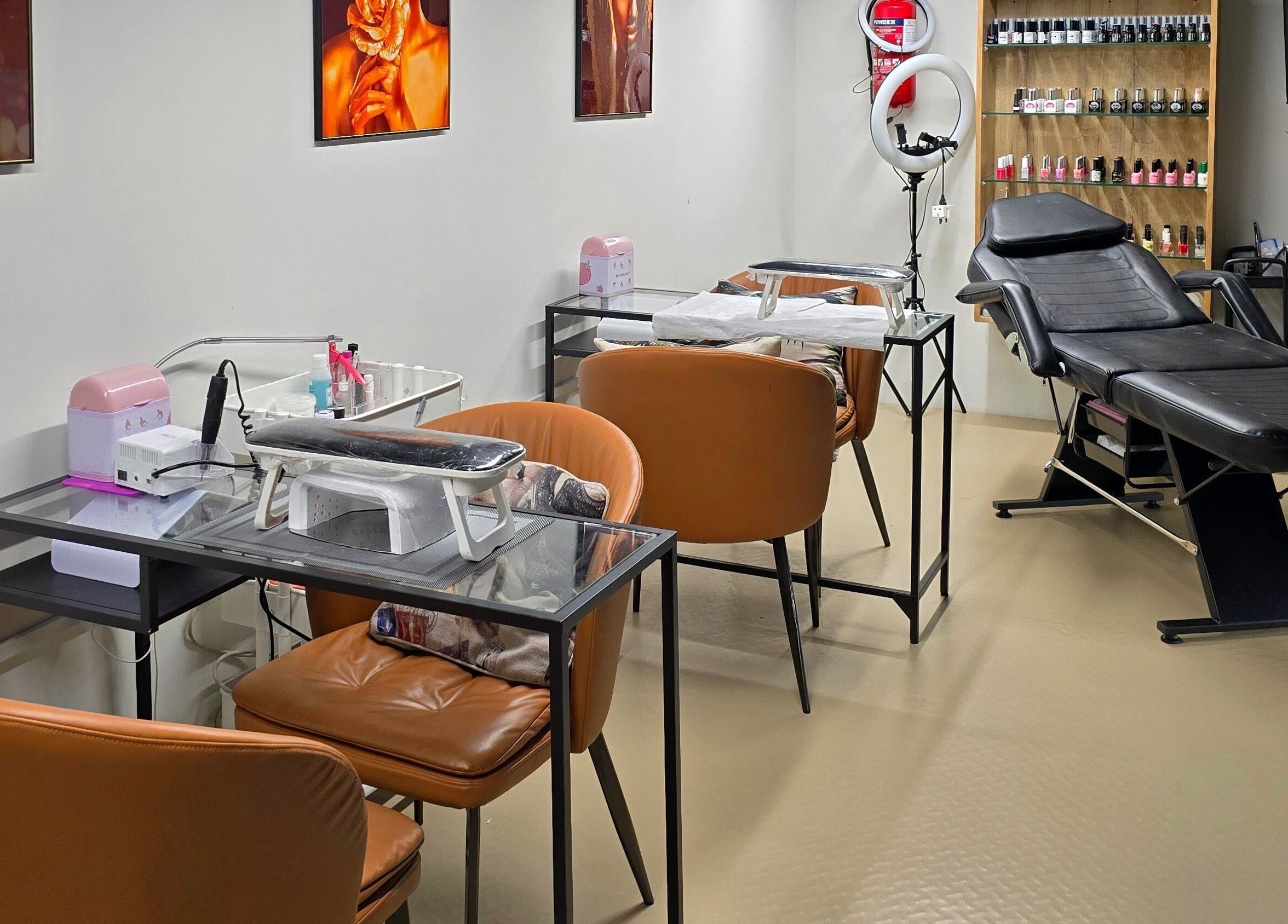 Interior of TREVI SALON showcasing manicure stations and relaxation chair in Dubai, Dubai, AE.