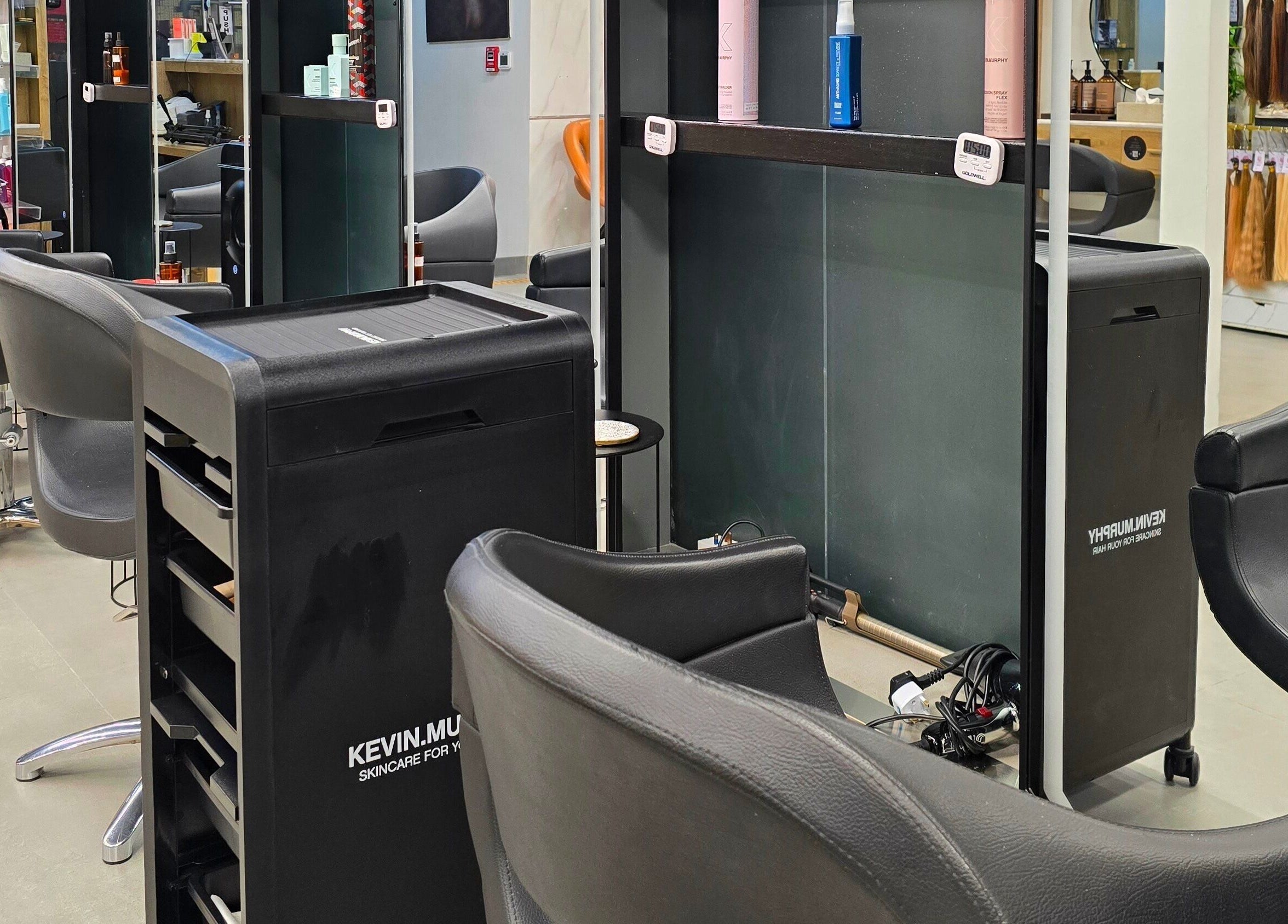 Modern styling chairs and products at TREVI SALON, Dubai, Dubai, AE, showcasing sleek salon design.