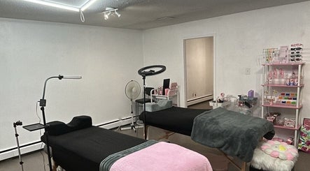 Relaxing treatment room at Lashes by Rina in Calgary, Alberta, CA, featuring professional spa beds and equipment.