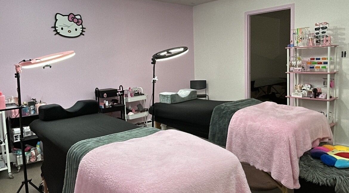 Inviting treatment room at Lashes by Rina, Calgary, Alberta, CA with plush beds and soft lighting.