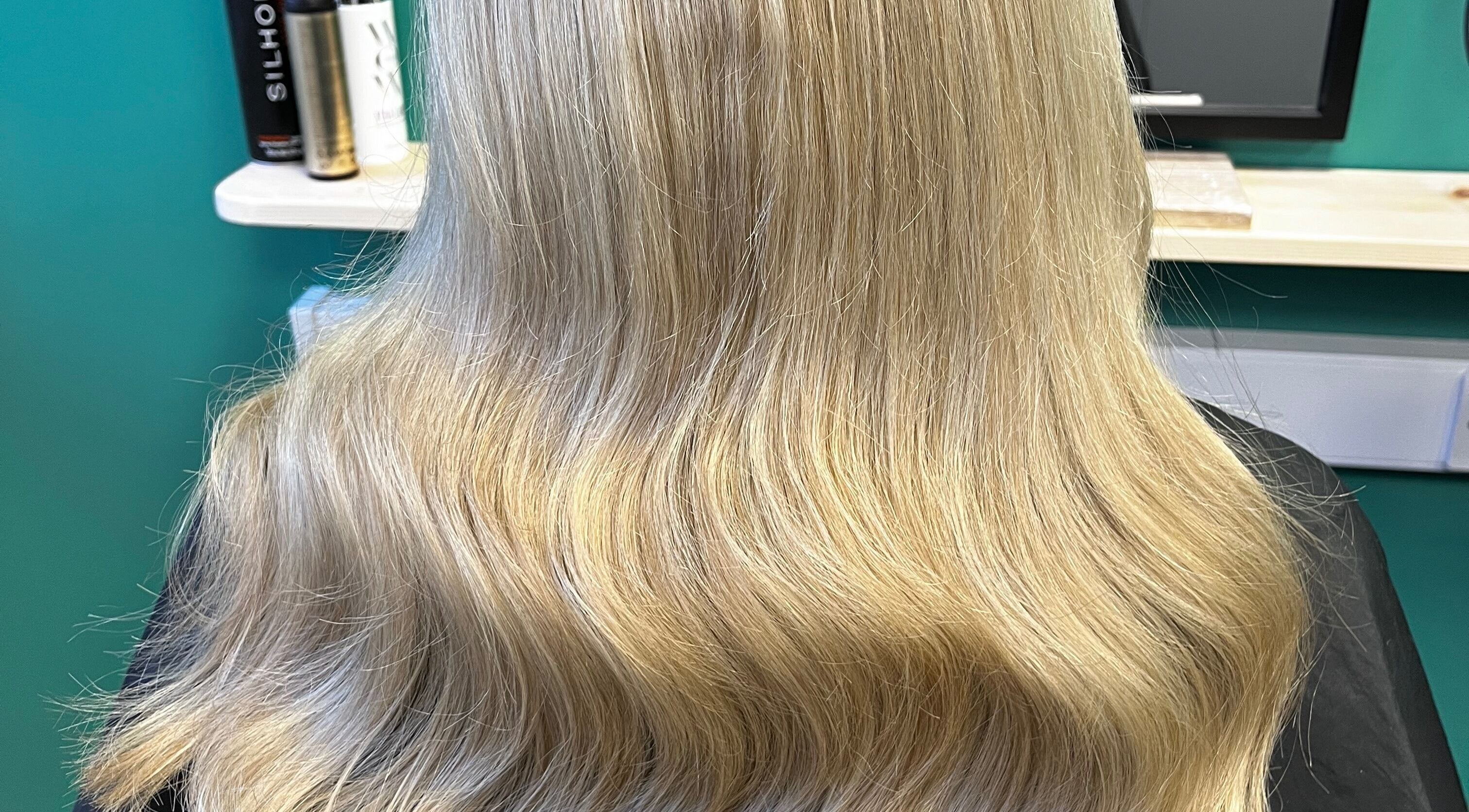 Beautiful blonde hair styling at Hair by Lisa Abel in Port Elphinstone, Scotland, GB.