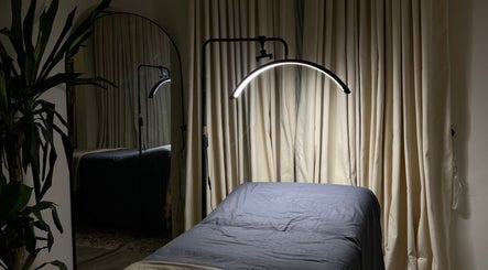 Cozy treatment room at ZABE BEAUTY AESTHETICS, Lagos, Lagos, NG with soft lighting and relaxing ambiance.