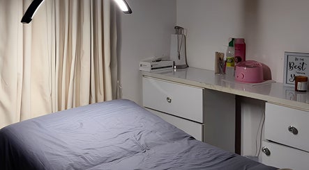 Relaxing treatment room at ZABE BEAUTY AESTHETICS, Lagos, Lagos, NG, featuring a comfortable bed and elegant decor.